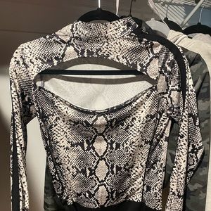 Manière De Voir bodysuit